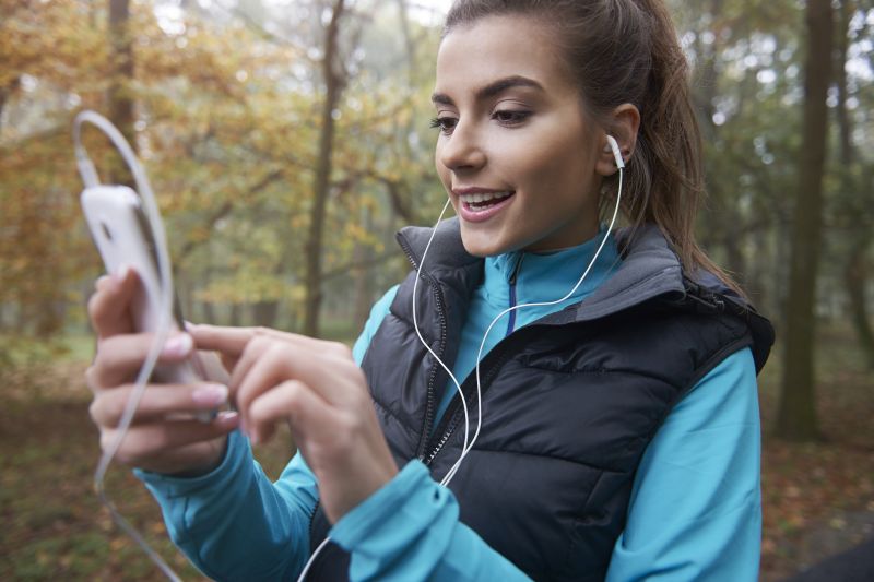 woman-using-technology-in-nature